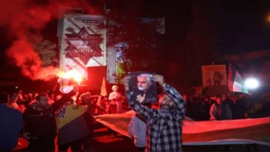 Iranians celebrate on a street, after the IRGC attack on Israel, in Tehran, Iran.