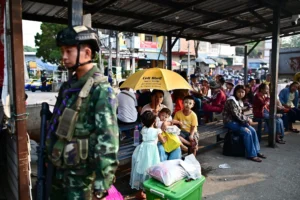 Myanmar residents after crossing into Mae Sot, Thailand